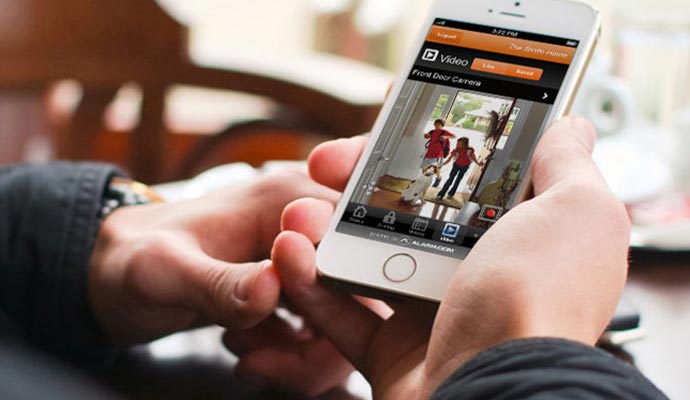 A person watching live footage of home A person watching live footage of home