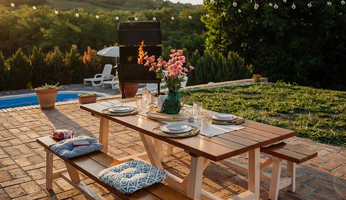 Outdoor dining area with a wooden picnic table