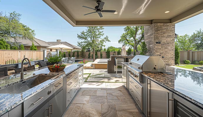 Modern outdoor kitchen with stainless steel appliances