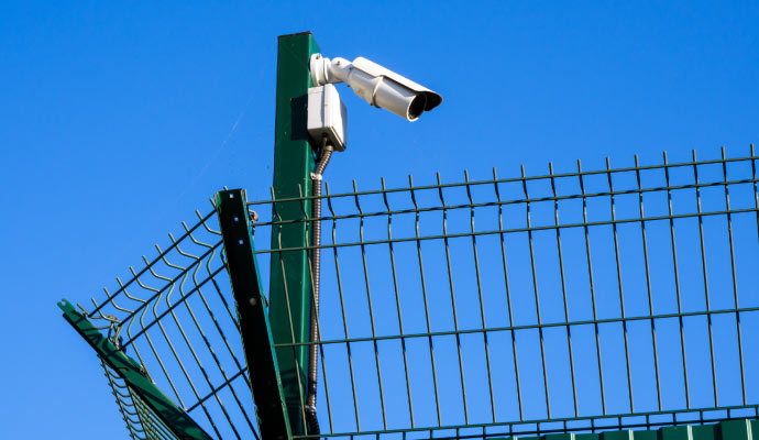 Perimeter surveillance camera mounted on a post